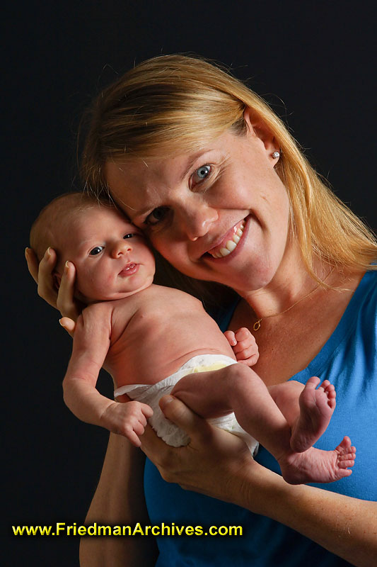 newborn,motherhood,pregnancy,infant,family,baby,joy,holding,girl,mother,week old,proud,birth,